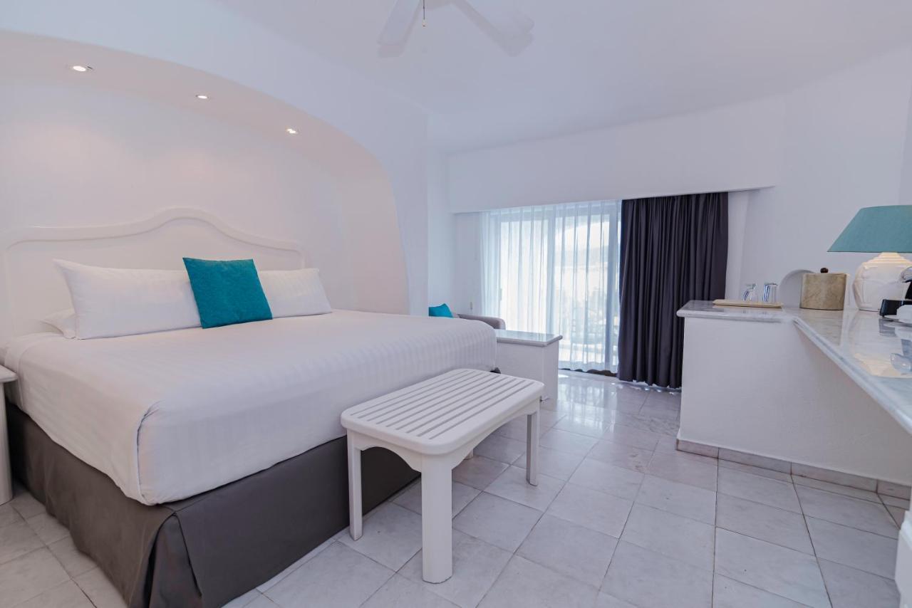 Las Hadas By Brisas Manzanillo Zewnętrze zdjęcie A room at the hotel